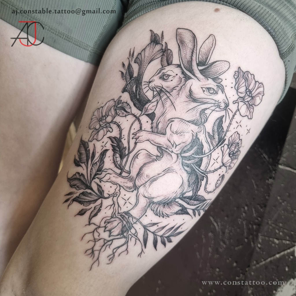 Black and grey, illustrative hare thigh tattoo by AJ Constable.