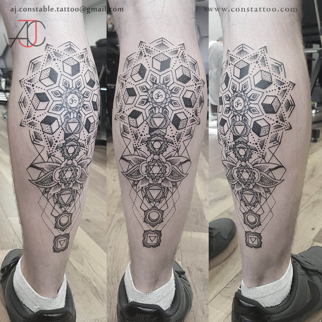 Black and grey geometrical calf tattoo by AJ Constable tattoo artist